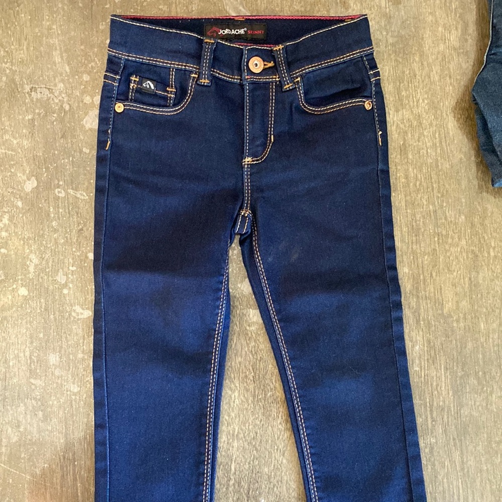 3T New Never Worn Jordache skinny jeans in  dark indigo.